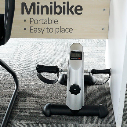 Mini Exercise Bike, Under Desk Bike Pedal Exerciser Portable Foot Cycle Arm & Leg Peddler Machine with LCD Screen Displays