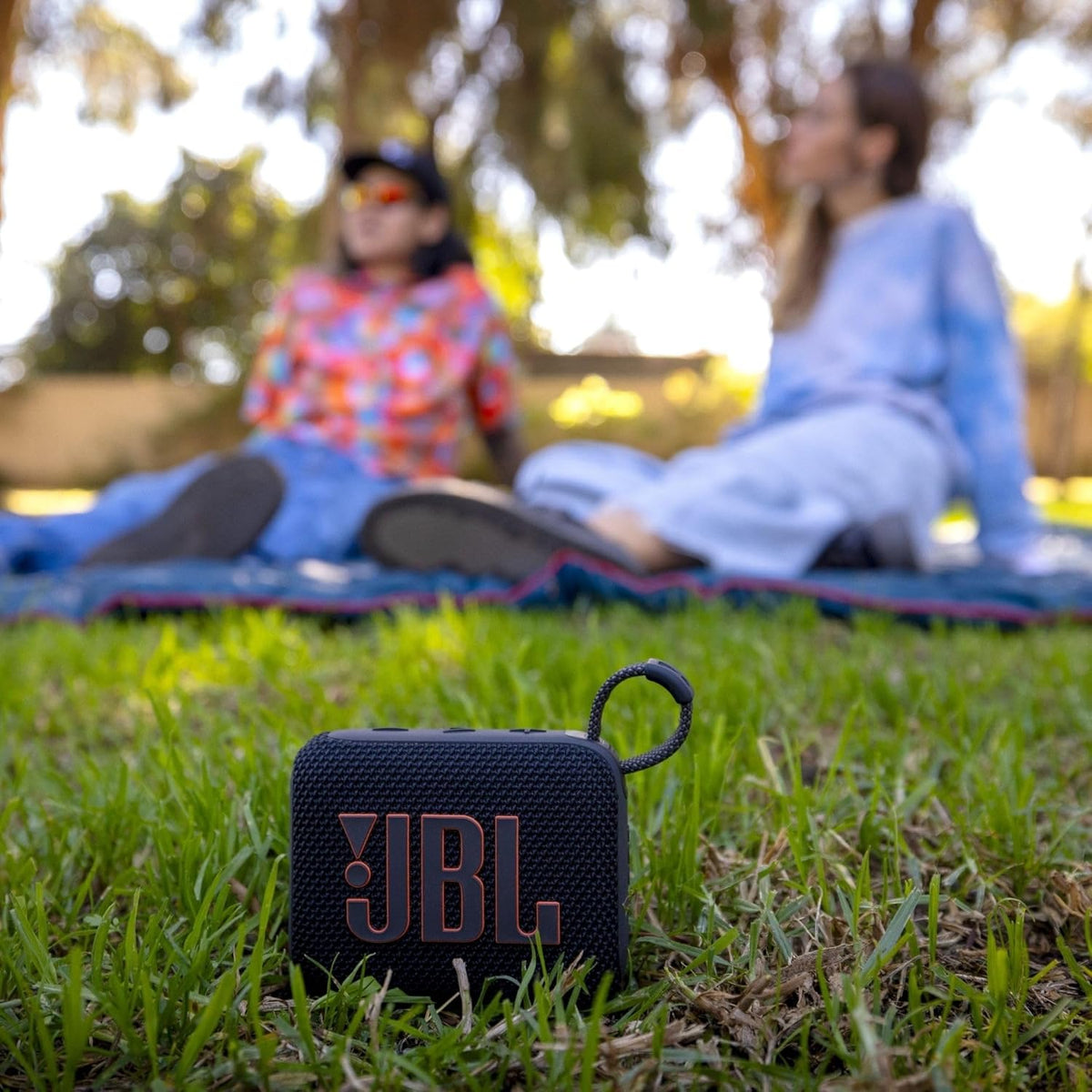 Go 4 - Ultra-Portable, Waterproof and Dustproof Bluetooth Speaker, Big Pro Sound with Punchy bass, 7-Hour Built-in Battery, Made in Part with Recycled Materials (Purple)